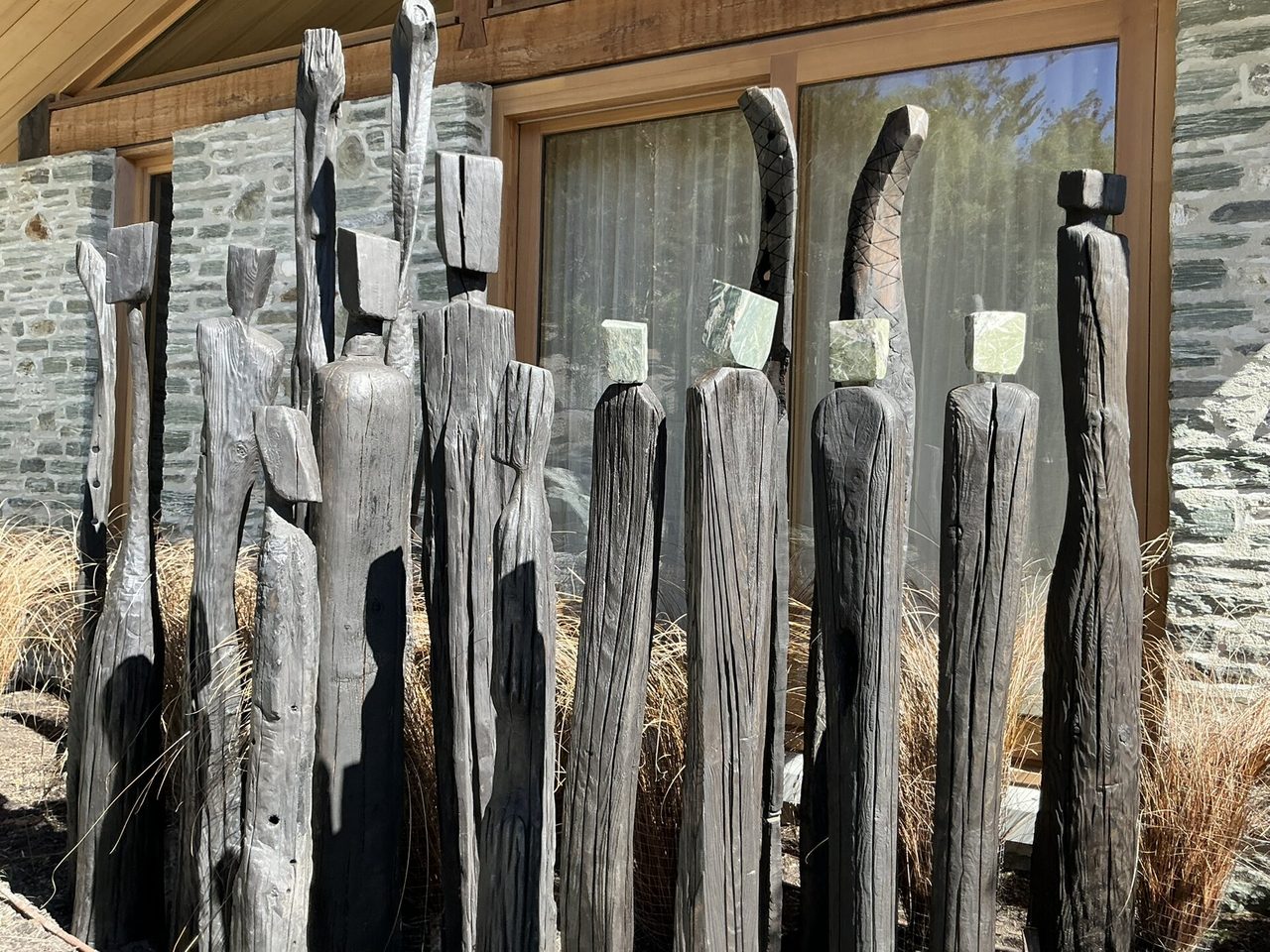 The Sixteen — ironbark sentinels installed in private grounds at Lake Hayes